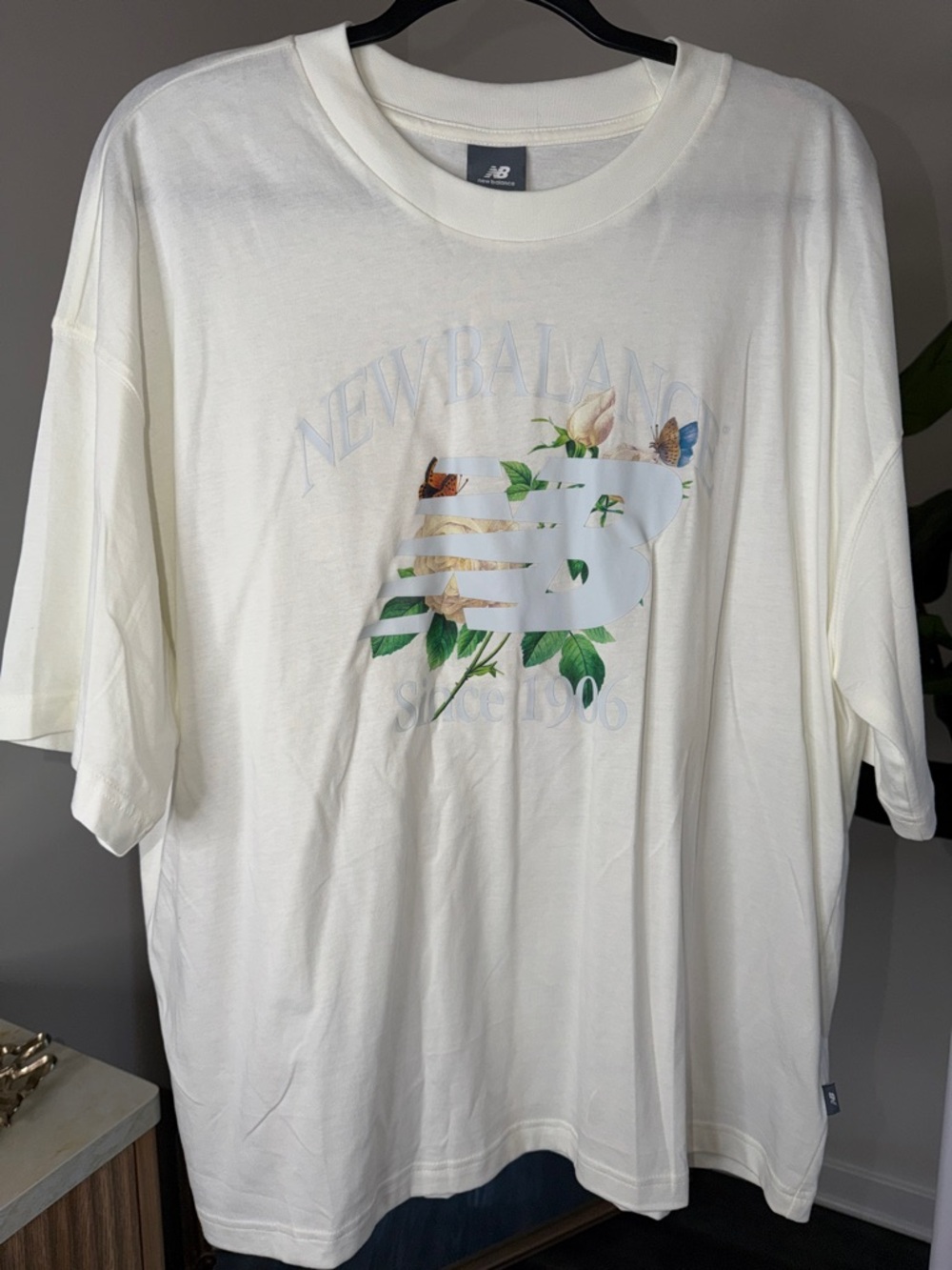 New Balance Cream Tee with Floral Logo